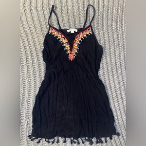 This is a Francesca’s summer dress ! Perfect for a beach vacation or a cover up!